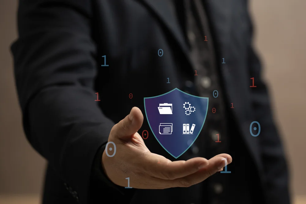 Risk and compliance documents with protective shield icon.